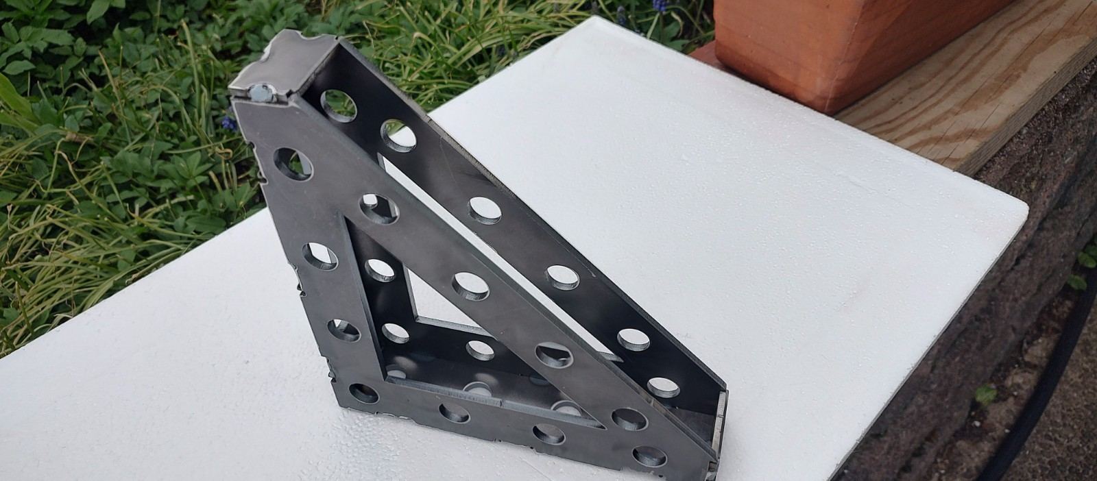 Eight inch laser-cut steel welding square with slotted mounting hole